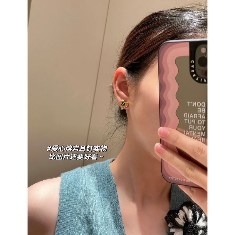 ch**an D*or earrings